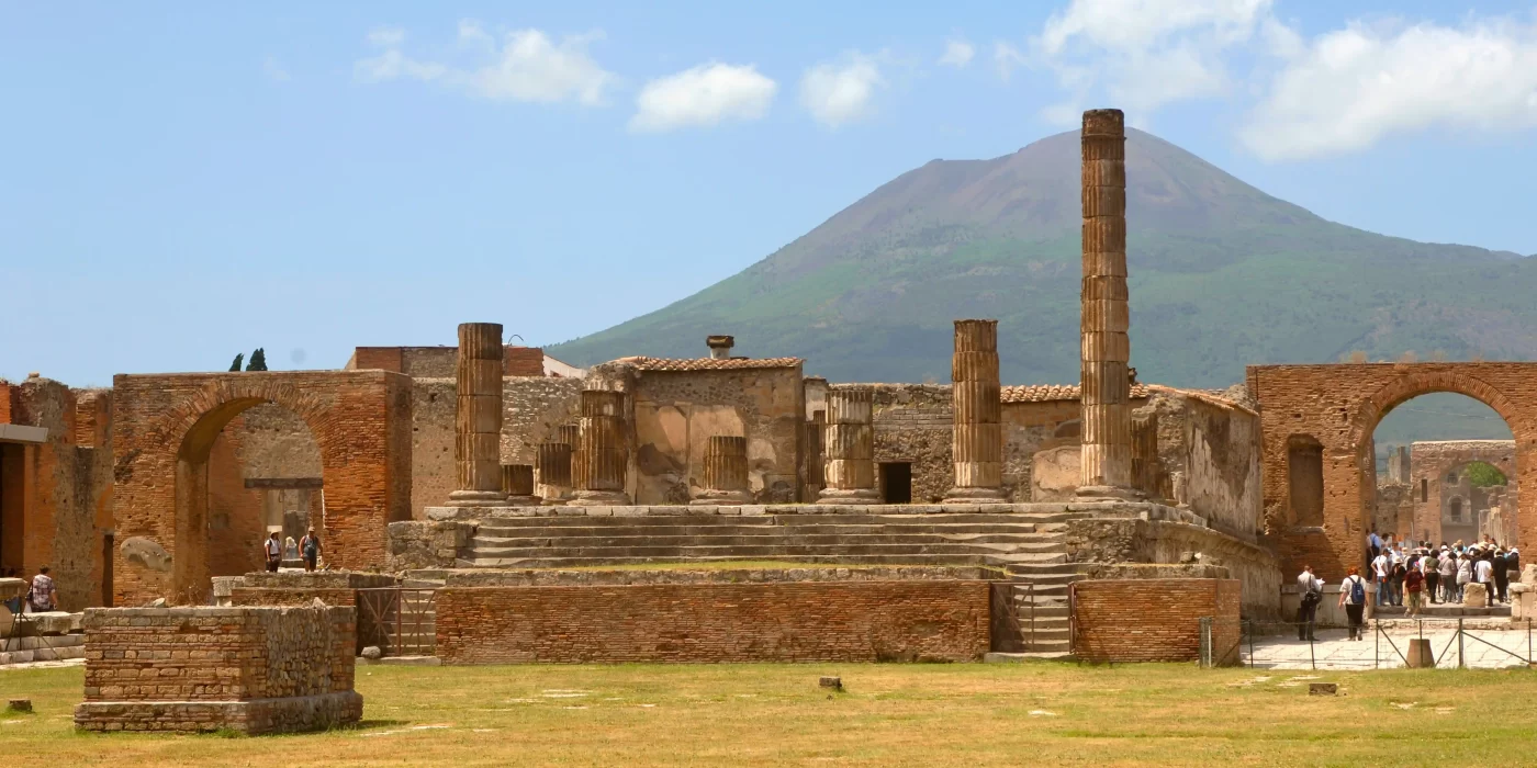 Ancient ruins of Pompeii with Mount Vesuvius in the background