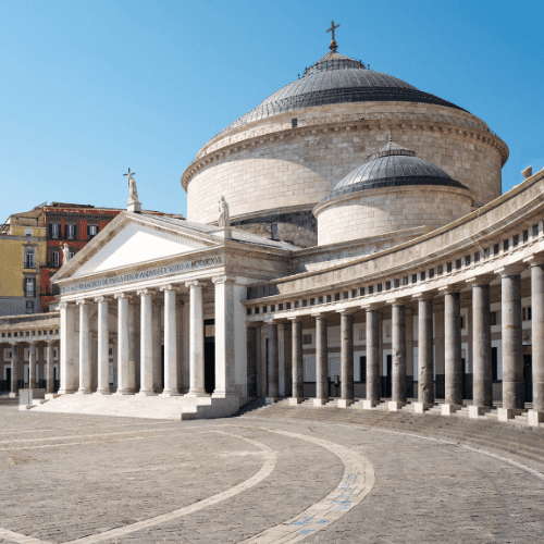 Piazza del Plebiscito in Naples, Italy, featuring the Basilica of San Francesco di Paola and its iconic colonnades.