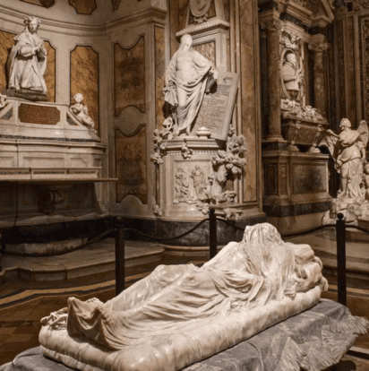 Interior of the Sansevero Chapel in Naples, featuring the Veiled Christ and intricate Baroque sculptures.