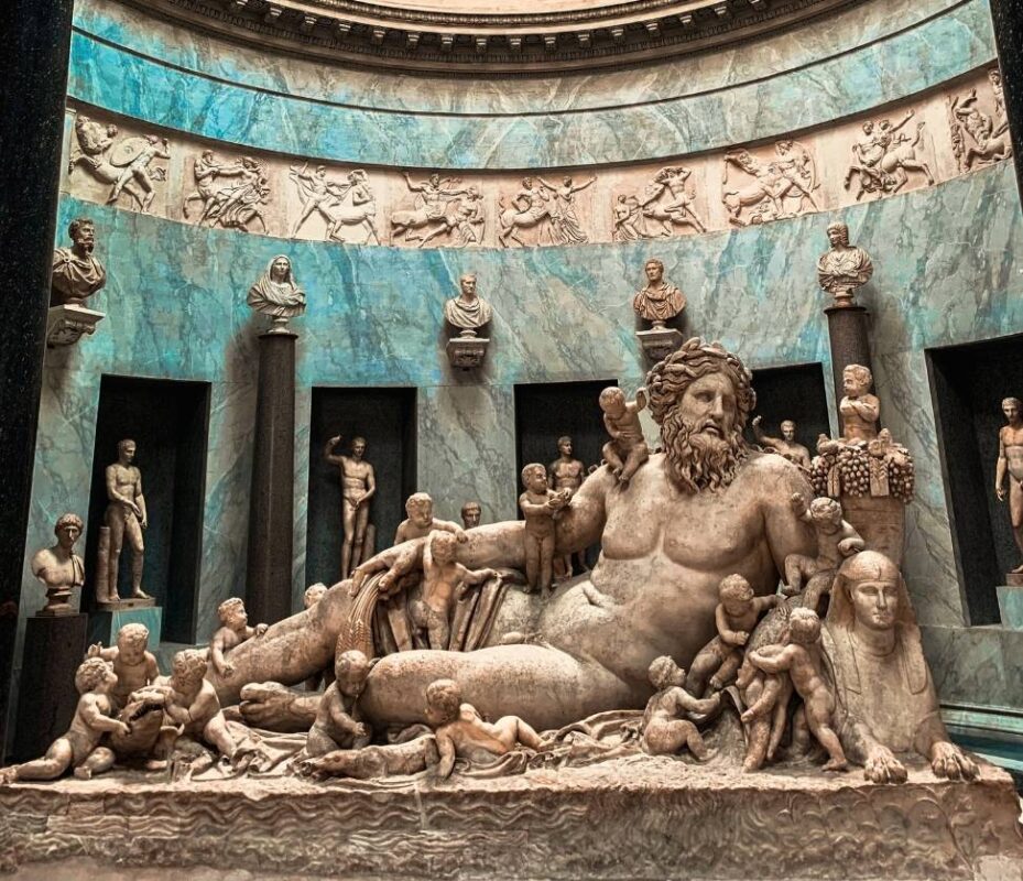 Reclining river god statue in the Vatican Museums