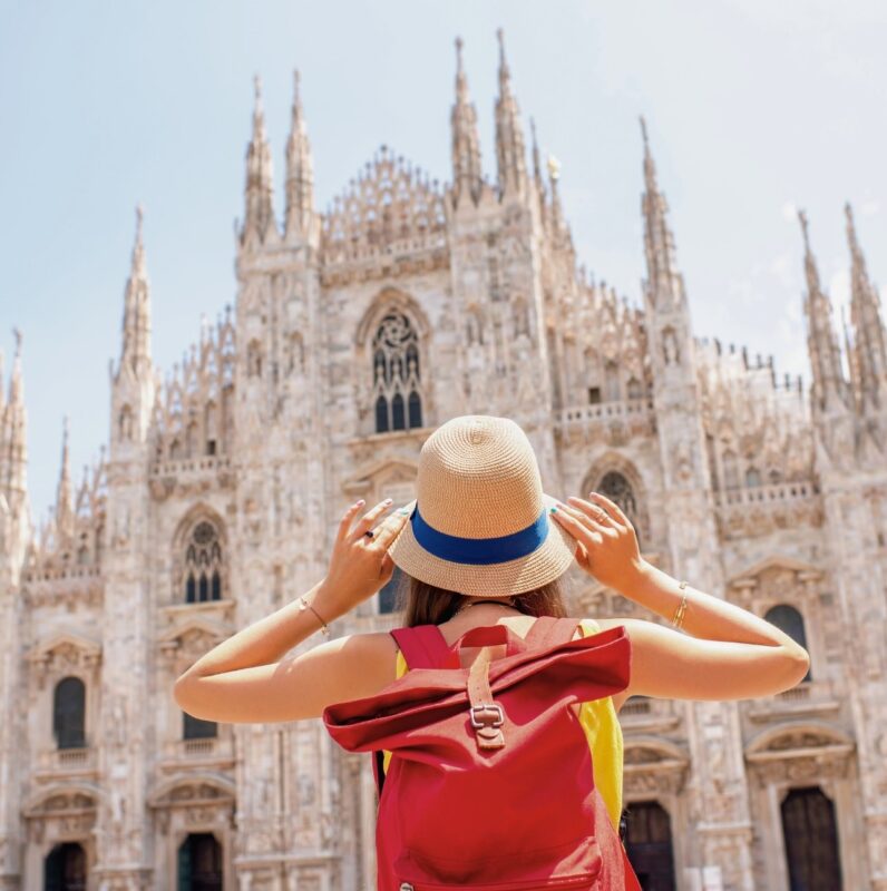 Tourist admiring the Duomo Cathedral on a Milan Walking Tour
