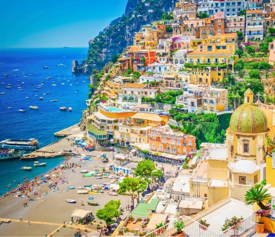Positano’s pastel-colored houses stacked along the cliff on the Amalfi Coast
