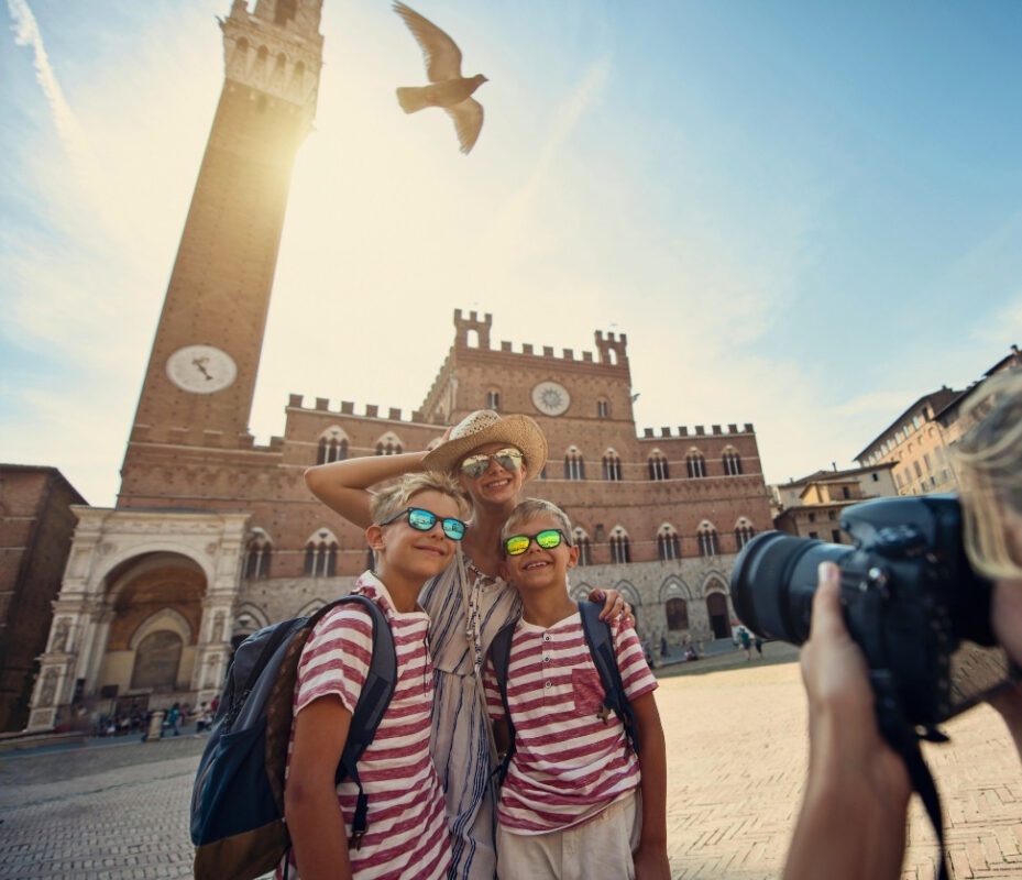 Tourists exploring Piazza del Campo in Siena during a Tuscany Tour