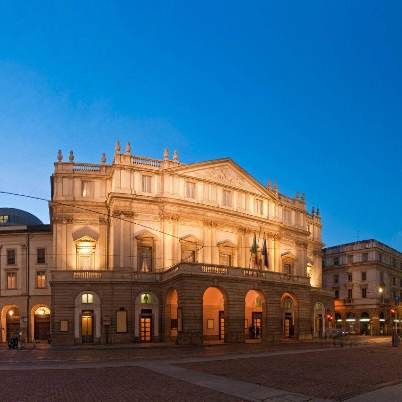 La Scala Opera House illuminated in the evening on Milan Walking Tour