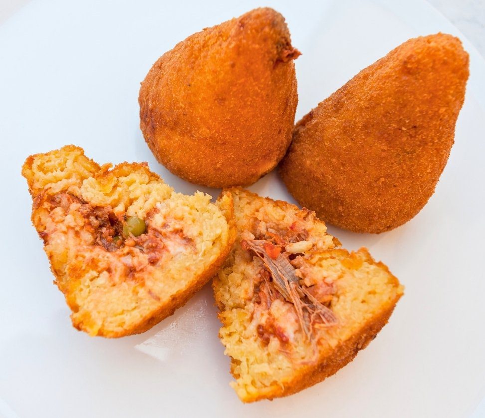 Arancine rice balls served on the Palermo Street Food Tour