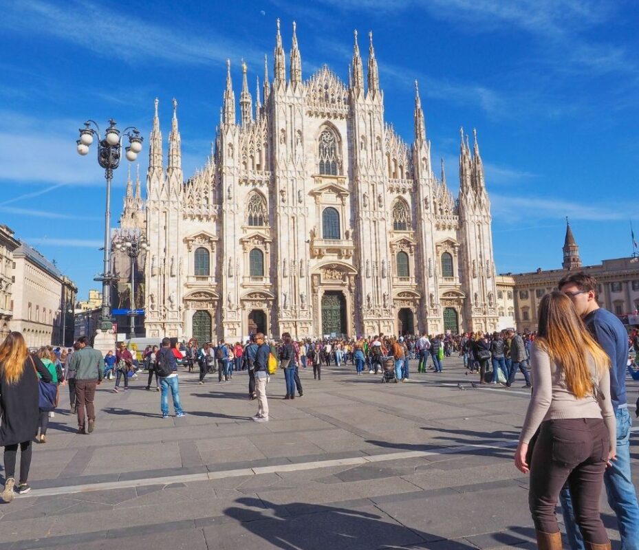 Duomo di Milano with tourists in front during a Milan Cathedral Tour