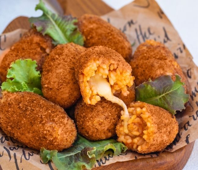 Traditional supplì served during Rome Street Food Tour