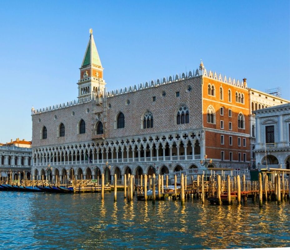 Exterior view of Doge’s Palace Venice from the Grand Canal during golden hour