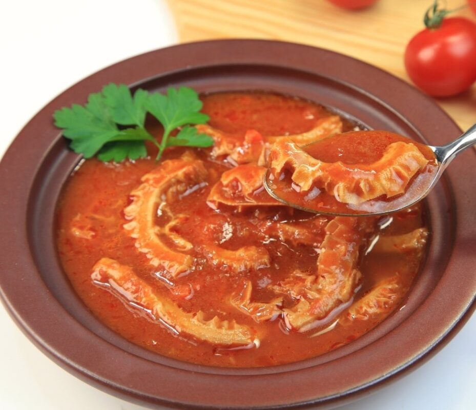 Sicilian tripe stew served with tomato sauce during Palermo Food Tour